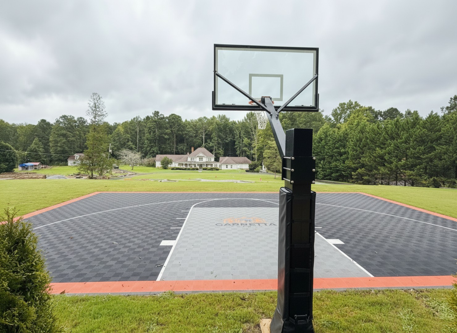 Shoot some hoops on your private basketball court, enjoying friendly competition and fresh air surrounded by lush greenery.