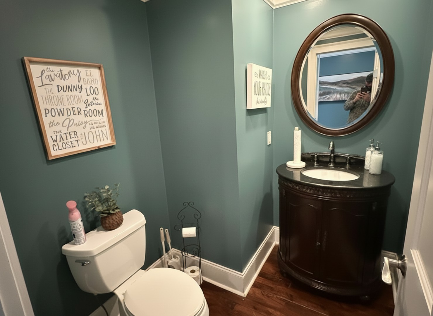 Refresh and rejuvenate in this thoughtfully designed powder room, offering both charm and convenience during your stay.